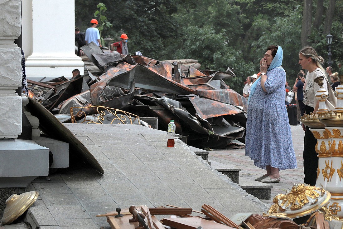 A woman reacts outside Transfiguration Cathedral, which was damaged during a Russian missile strike, amid Russia's attack on Ukraine, in Odesa July 23, 2023. (OSV News photo/Nina Liashonok, Reuters)