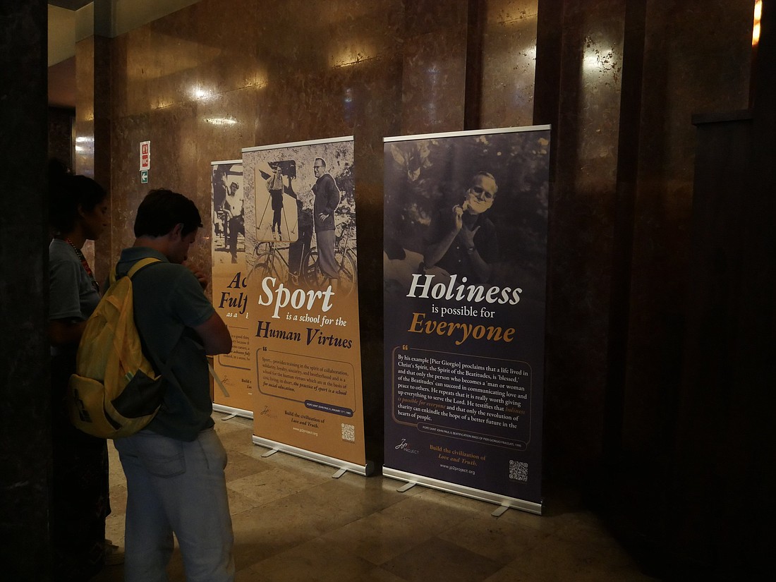 An exhibition at the Church of Our Lady of the Rosary of Fatima in Lisbon, Portugal, displays relics of St. John Paul II, Blessed Pier Giorgio Frassati, and Sts. Jacinta and Francisco Marto for veneration by pilgrims Aug. 1-4, 2023, at World Youth Day. (OSV News photo/JPII Project)