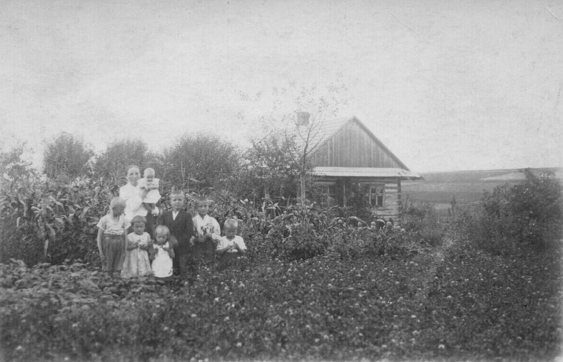 Wiktoria Ulma is pictured in an undated photo with three of her children and the children of relatives outside the Ulma home in Markowa, a village in southeastern Poland. Wikotria, her husband, Józef, and their six children were executed March 24, 1944, by Nazis who discovered that the family had been sheltering eight Jews who had escaped internment by German occupying forces. Two of the Ulma girls, Stasia and Basia, are pictured in the middle near their mother, who is holding son Wlodzimierz. (OSV News photo/ courtesy National Remembrance Institute)