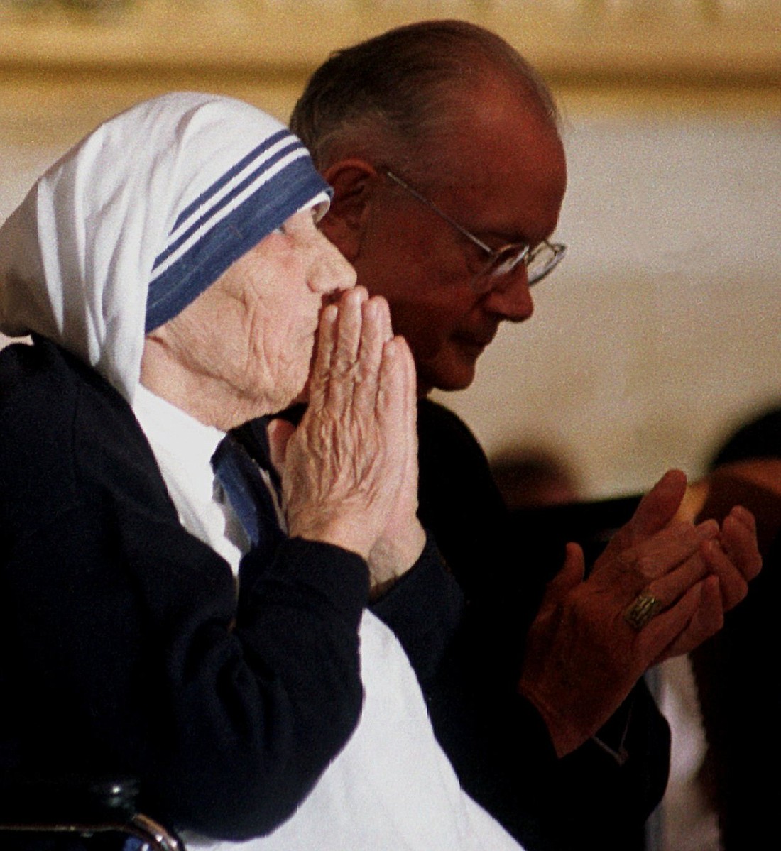 St. Teresa of Kolkata pauses as she is awarded the Congressional Gold Medal June 5, 1997. Her feast day is Sept. 5. (OSV News photo/CNS file, Bob Roller)