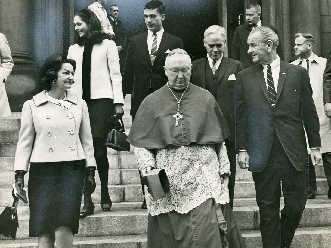 Then-Archbishop Patrick A. O'Boyle of Washington walks with U.S. President Lyndon B. Johnson following a 1968 Mass in Washington. The archbishop, who was later named a cardinal, was a vocal supporter of the Civil Rights Act, signed into law by Johnson July 2, 1964. He also integrated Catholic schools in the Washington Archdiocese 16 years before the Civil Rights Act. (OSV News photo/CNS file)