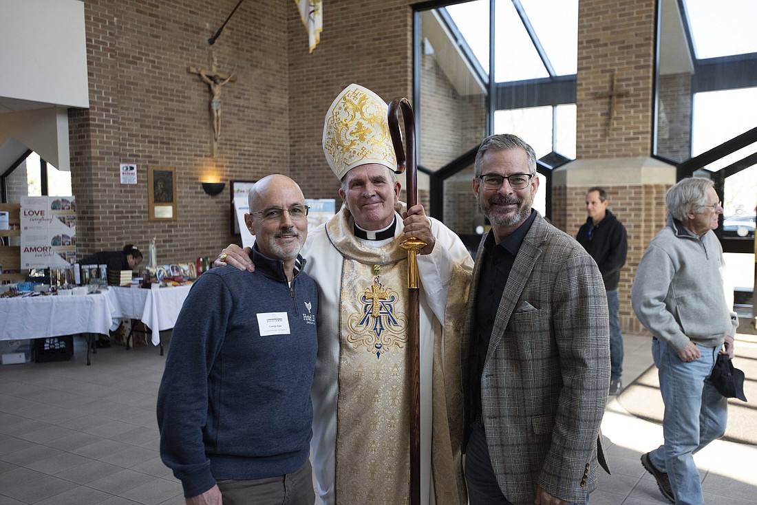 George Rose, a parishioner of St. Raphael-Holy Angels Parish, Hamilton, and a board member and left, with Bishop O'Connell and Bill Maher, Catholic Men for Jesus Christ conference president and also a conference organizer for the Diocese, died Aug. 27 following a lengthy illness. Jeff Bruno photo