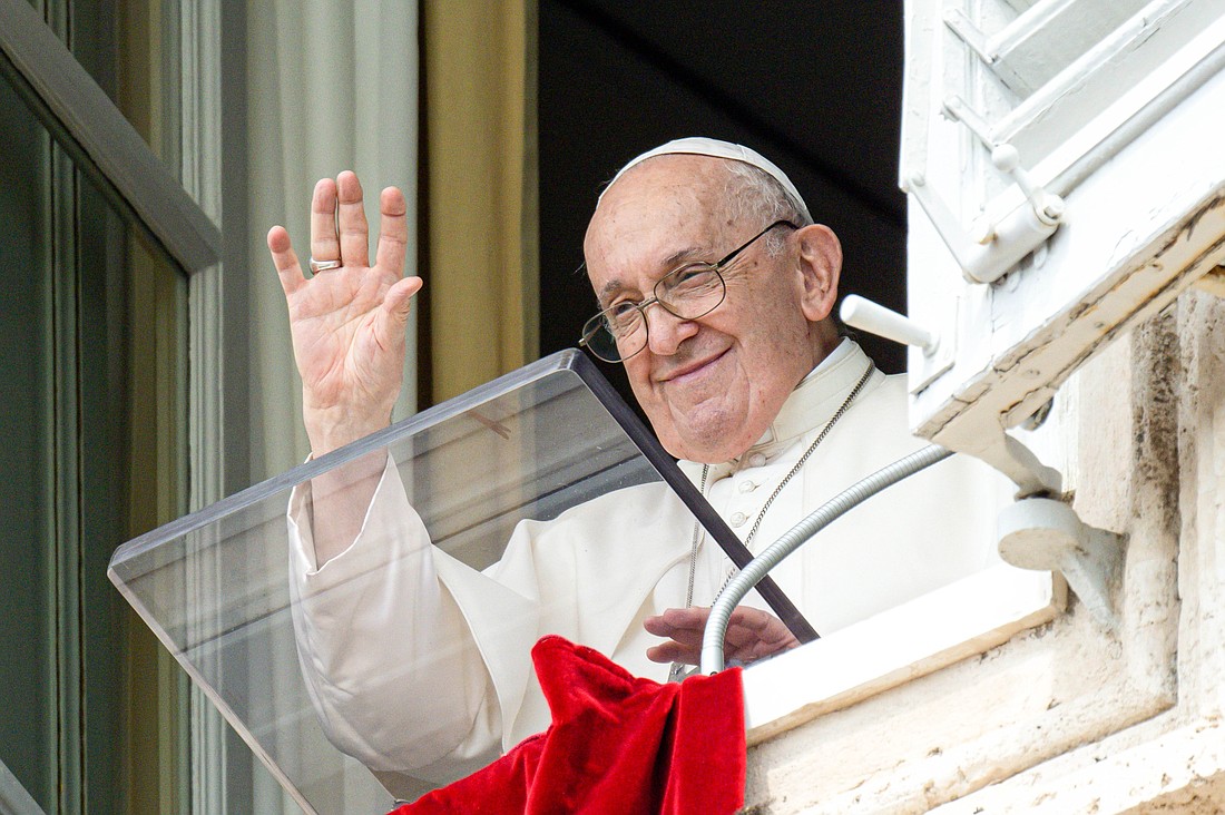 Pope Francis greets visitors gathered in St. Peter's Square at the Vatican to pray the Angelus Aug. 27, 2023. (CNS photo/Vatican Media)