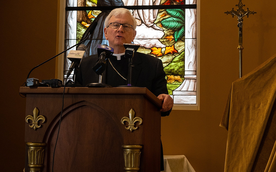 Bishop David L. Ricken speaks of Green Bay, Wis., April 20, 2023, at the National Shrine of Our Lady of Champion in Champion. Behind him is a stained glass image of the Blessed Mother appearing to Adele Brise. He announced the shrine has changed its name from the National Shrine of Our Lady of Good Help. A solemnity Mass is to be celebrated each year on Oct. 9, the anniversary of the 1859 apparitions of the Blessed Virgin Mary to Adele Brise. OSV News photo/Sam Lucero