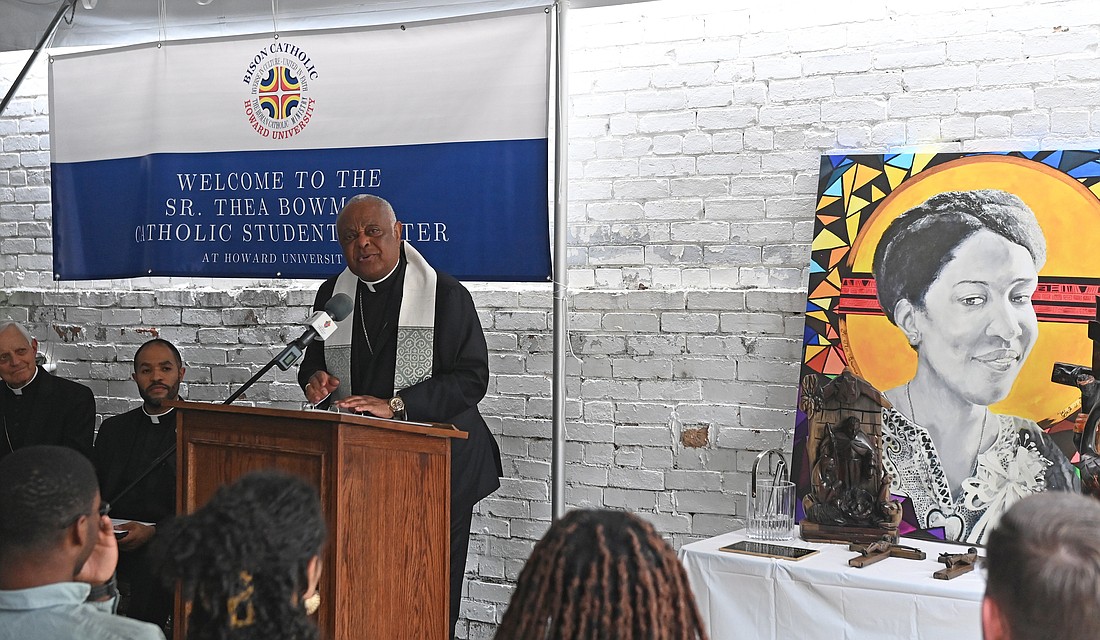 Washington Cardinal Wilton D. Gregory speaks during a ceremony Aug. 28, 2023, where he blessed and dedicated the new Sister Thea Bowman Catholic Student Center at Howard University in the nation's capital. At left are Cardinal Donald W. Wuerl, retired archbishop of Washington, and Father Robert Boxie III, the Catholic chaplain at Howard University. (OSV News photo/Patrick Ryan, Catholic Standard)