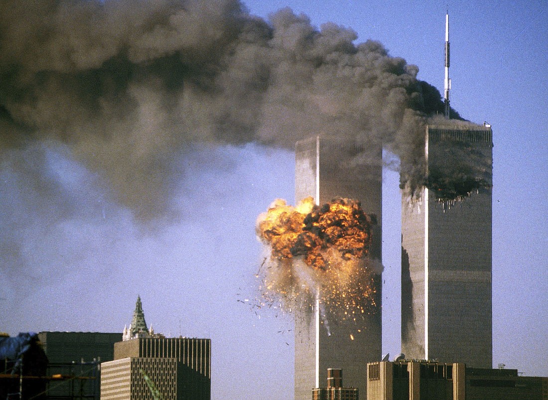 The South Tower of the World Trade Center bursts into flames after being struck by United Airlines Flight 175 in New York in this Sept. 11, 2001, file photo. Nearly 3,000 people died when four hijacked planes were used in coordinated strikes on the U.S., hitting the Pentagon and the World Trade Center towers. One of the planes crashed in Pennsylvania. (OSV News photo/Sean Adair, Reuters)
