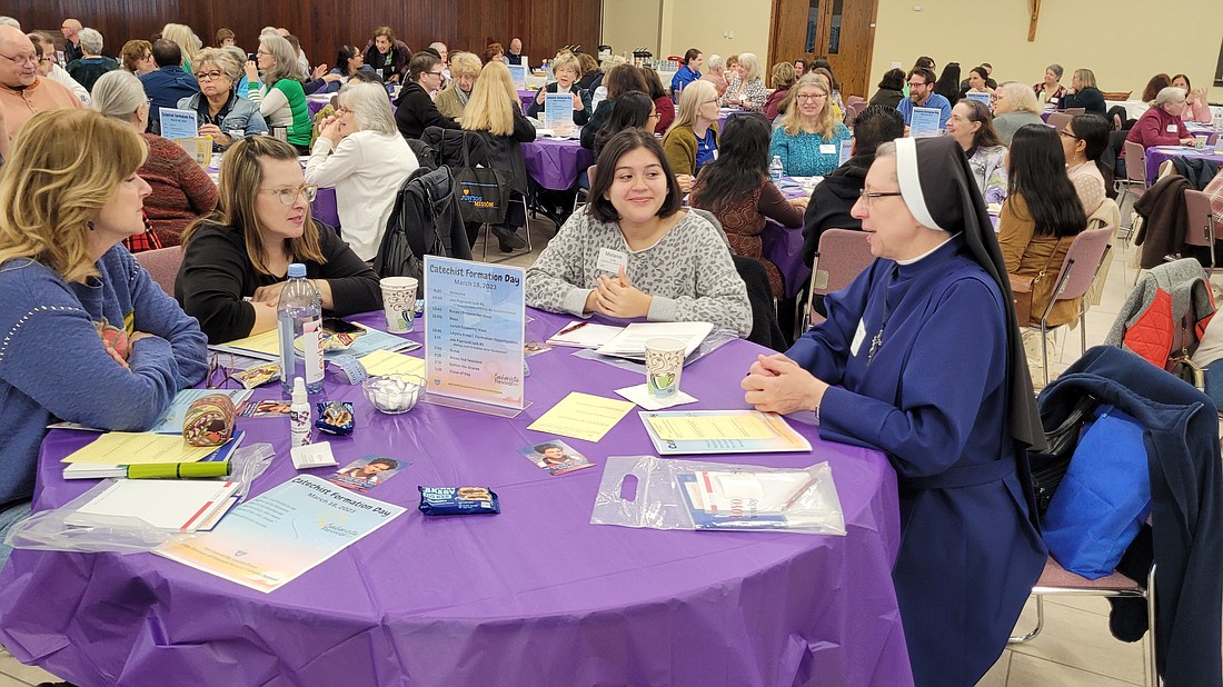 Persons serving in catechetical ministry attend a daylong workshop on the Eucharistic Revival in March. Denise Contino speaks of how passing on the faith to young people is a priority in the Diocese. Mary Stadnyk photo
