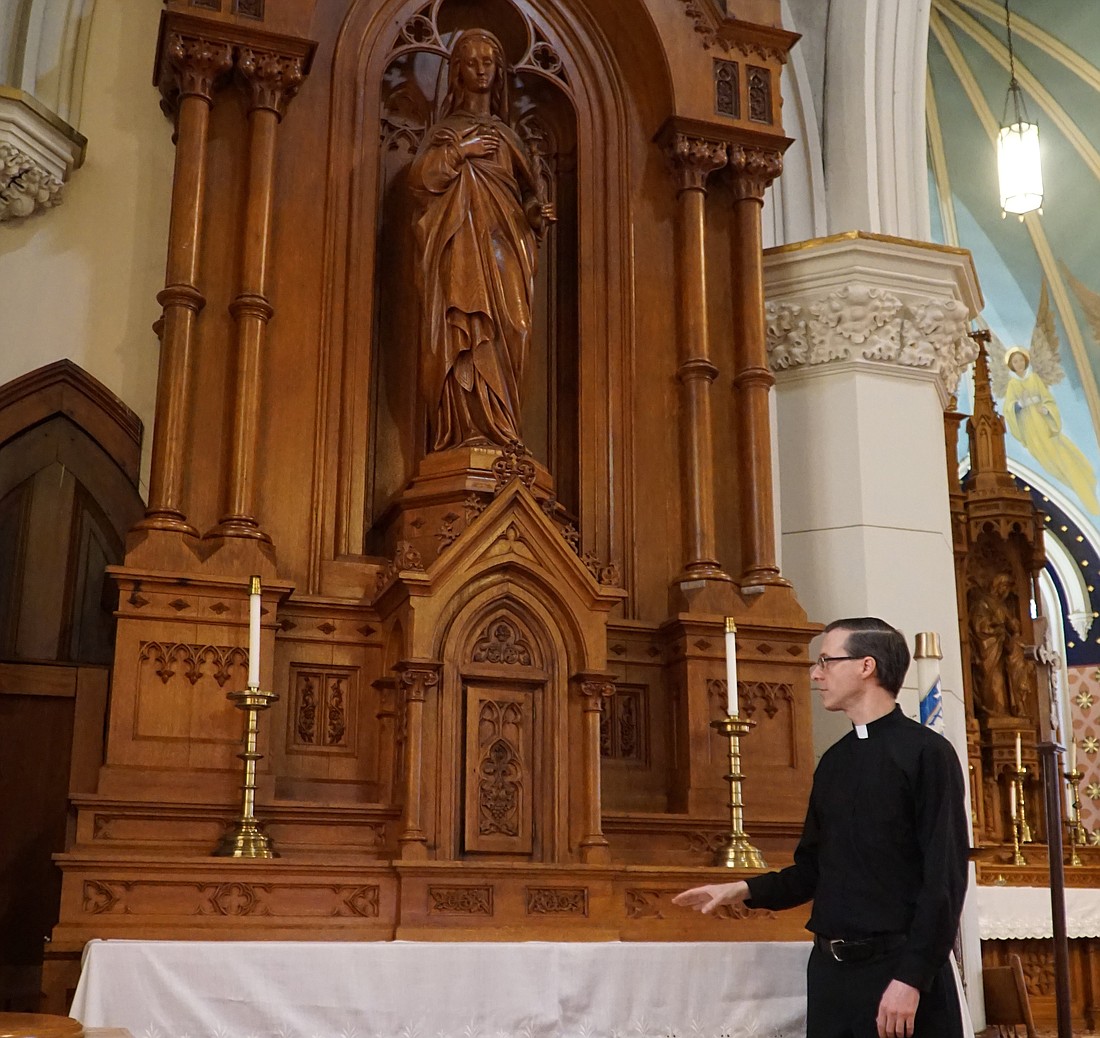 Father Matthew Hardesty, pastor, talks about the side altar inside St. Vincent de Paul Church in New Hope, Ky., Feb. 21, 2023, where a scene was filmed for Ethan Hawke's movie "Wildcat" about the life of author Flannery O'Connor. Maya Hawke, Ethan's daughter, portrays O'Connor in the movie, which was was screened at a premiere event Sept. 11 at the Toronto International Film Festival. (OSV News photo/Ruby Thomas, The Record)
