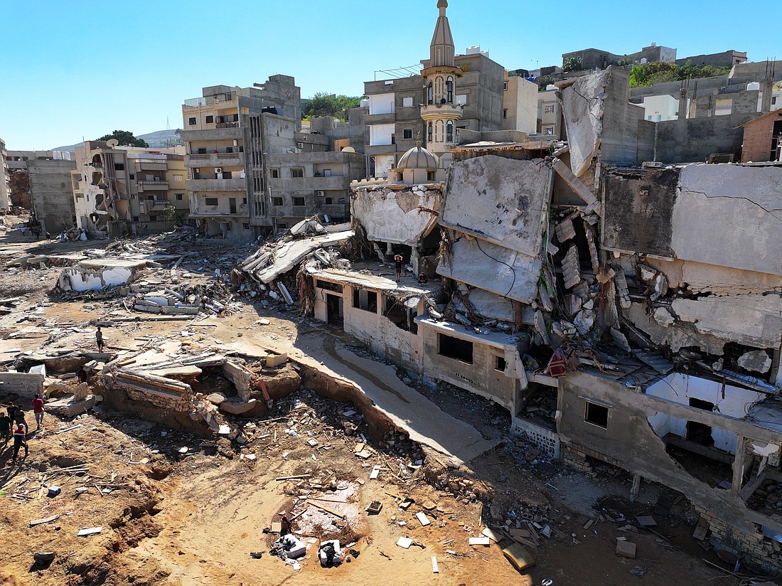 Destroyed buildings are seen in Derna, Libya, Sept. 13, 2023, in the aftermath of deadly flooding. Search teams combed streets, wrecked buildings and even the sea to look for bodies in a coastal Libyan city where the collapse of two dams unleashed a massive flash flood that killed more than 11,000 people, with thousands missing. (OSV News photo/Marwan Alfaituri, social media via Reuters)