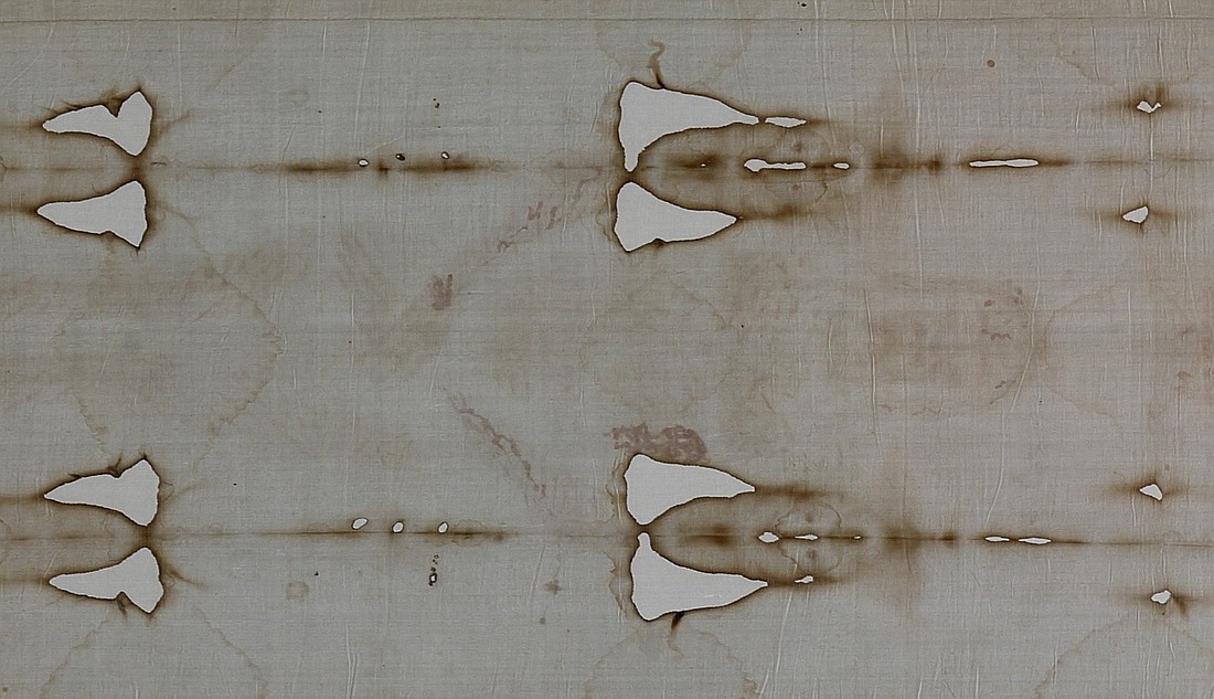 A detail view of the Shroud of Turin is seen at the Cathedral of St. John the Baptist in Turin, Italy. (CNS photo/Paul Haring)