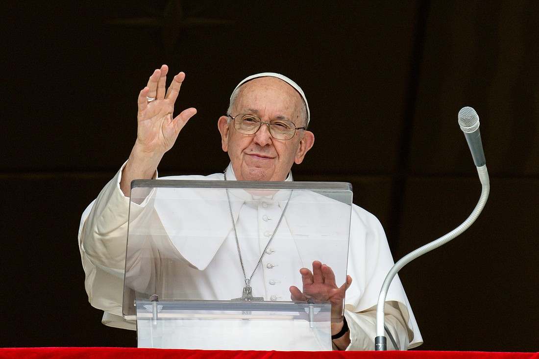 Pope Francis greets visitors gathered in St. Peter's Square at the Vatican to pray the Angelus Sept. 17, 2023. (CNS photo/Vatican Media)