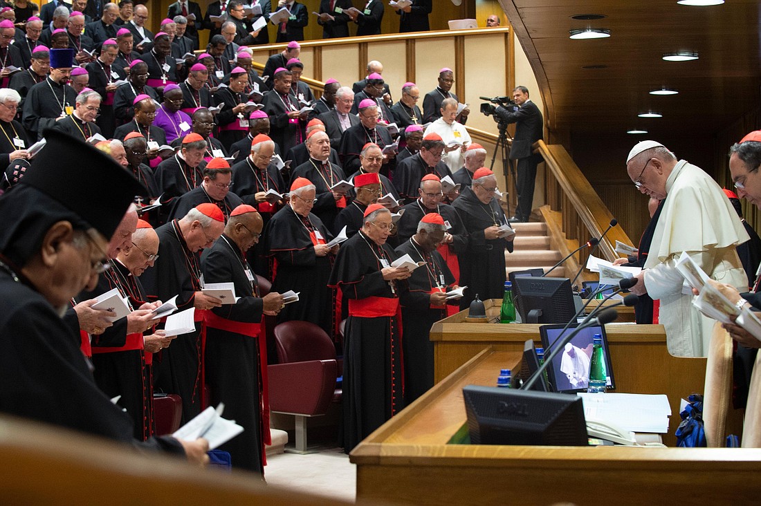 Pope Francis participates in morning prayer during a session of the Synod of Bishops on young people in this file photo from 2018. The October assembly of the "synod on synodality" has been designed to include more times for shared prayer -- both publicly and among synod members only. (CNS photo/Vatican Media)