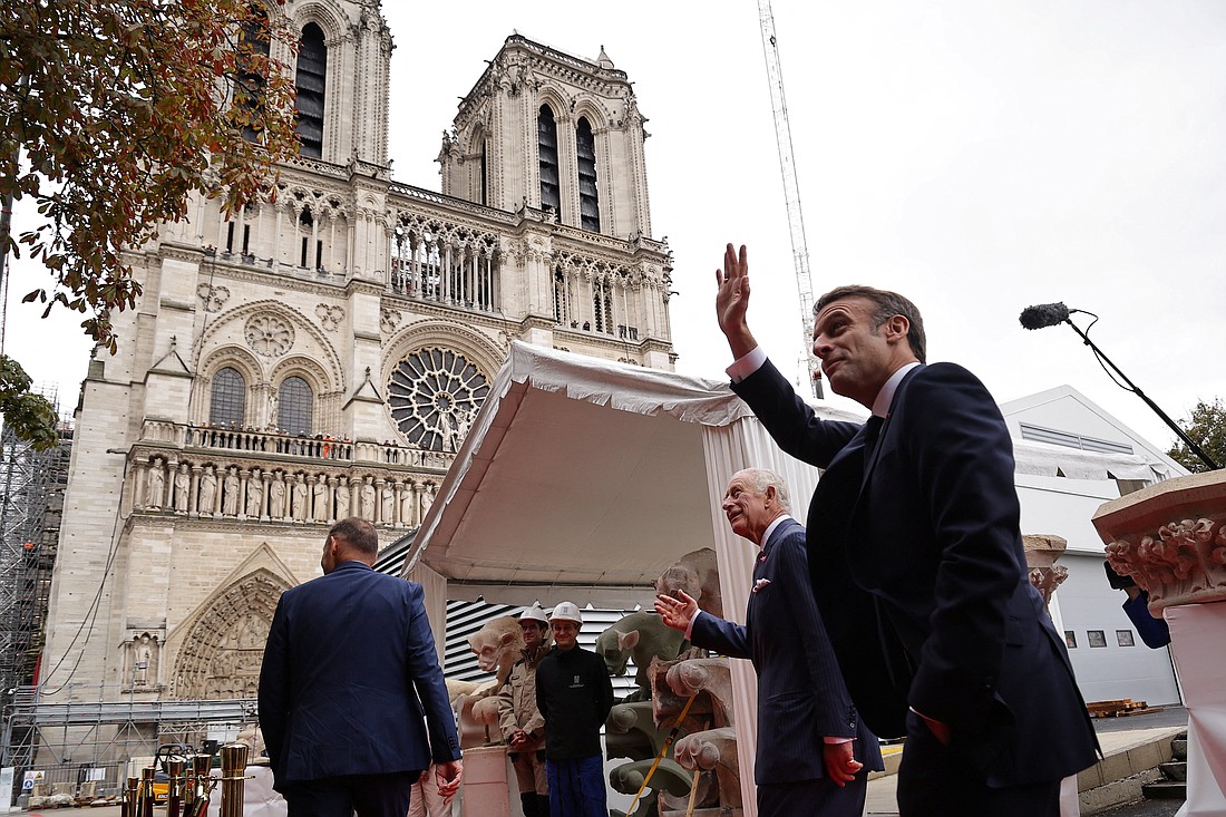 Britain's King Charles III and French President Emmanuel Macron visit the Notre-Dame Cathedral rebuilding site in Paris Sept. 21, 2023. Macron confirmed Sept. 15 that he planned to attend Mass celebrated by Pope Francis in Marseille Sept. 23, but he emphasized he would not be going "as a Catholic" but as the "president of the French Republic, which is indeed secular." (OSV News photo/Christophe Petit Tesson, pool via Reuters)