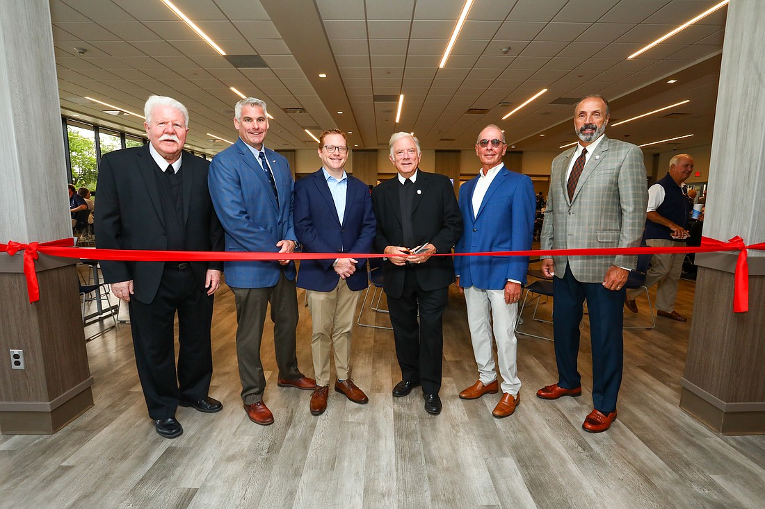 Pictured from left at Christian Brothers Academy's Dedication Day are, from left,  former president Christian Brother Thomas Gerrow, current president Ross Fales, John Shibles '96; former president Christian Brother Frank Byrne, '75, Don Norkus, '67, and board chairman Joe Tort '76. Courtesy photo
