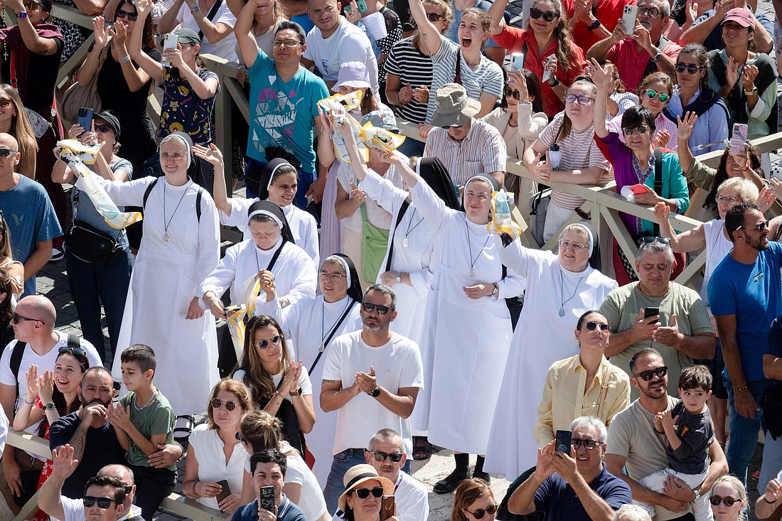 Visitors gather in St. Peter's Square at the Vatican to pray the Angelus with Pope Francis Sept. 24, 2023. (CNS photo/Vatican Media)