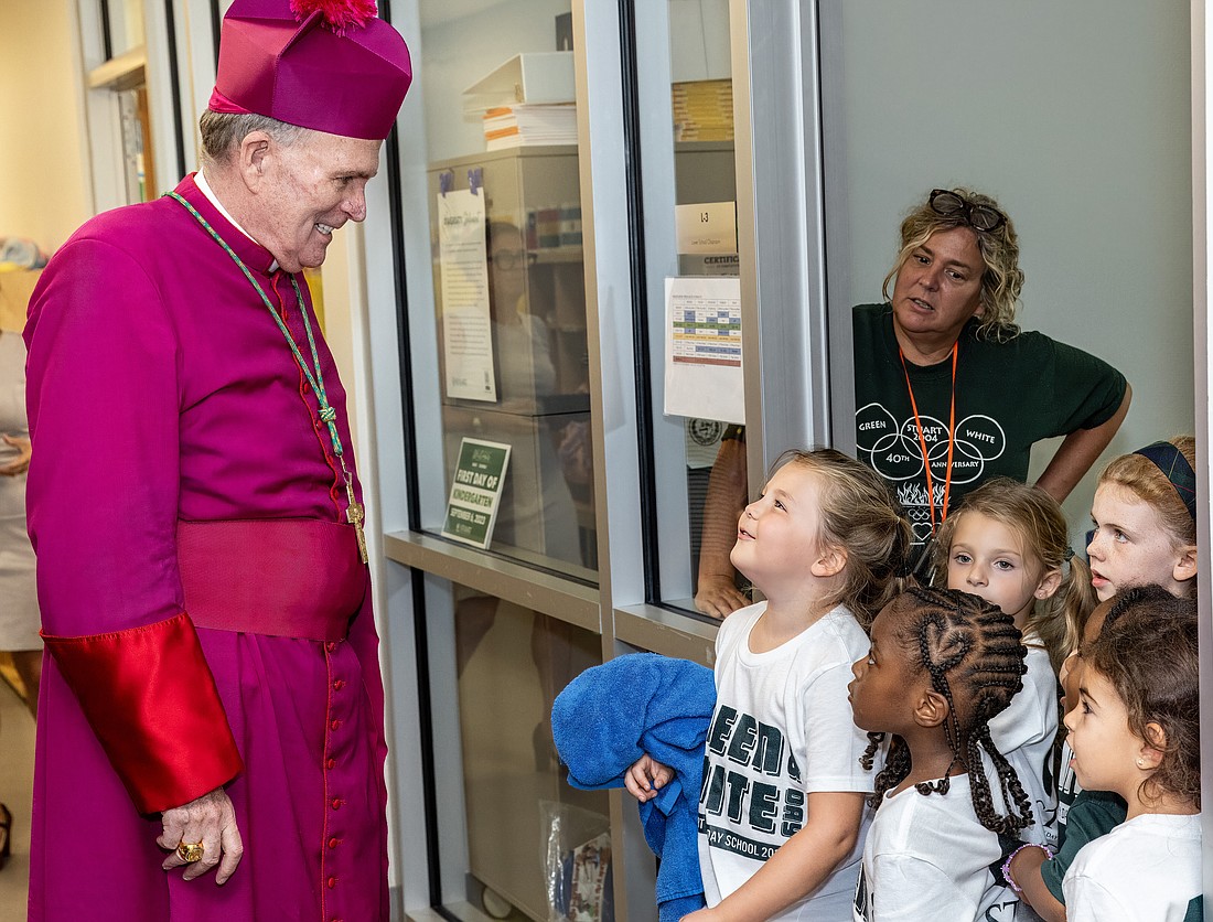 Bishop O'Connell chats with young students during his visit to Stuart Country Day School of the Sacred Heart, Princeton, on Sept. 22. Hal Brown photo