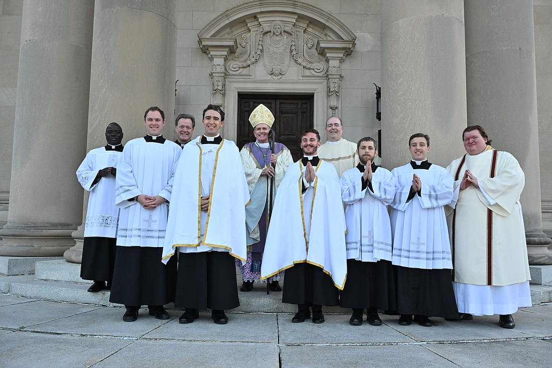 Bishop David M. O'Connell, C.M., poses for a photo on the steps of St. Charles Seminary, Wynnewood, Pa. He is joined by the six men from the Diocese who are preparing for the priesthood there as well as Father Jean Felicien, the Bishop's secretary and master of ceremonies; Father Keith Chylinski, seminary rector, and Father Patrick Brady, vice rector and director of seminarians. Mike Ehrmann photo