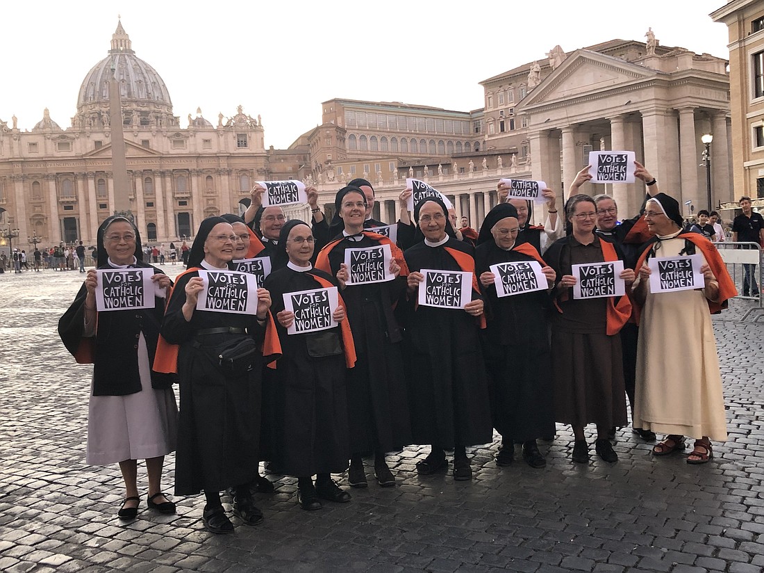 A group of Benedictine nuns from Fahr Monastery near Basel, Switzerland, call for "Votes for Catholic Women" at the Vatican during the October 2019 Synod of Bishops for the Amazon. For Oct. 4-29, 2023, Synod of Bishops in Rome, church members who are not bishops, including women, will be allowed to vote. (OSV News photo/Deborah-Rose Milavec, courtesy Global Sisters Report)