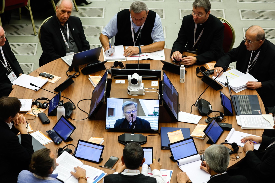 Members of the assembly of the Synod of Bishops begin work on the communion as the second theme of the synod in the Vatican's Paul VI Audience Hall Oct. 9, 2023. (CNS photo/Lola Gomez)