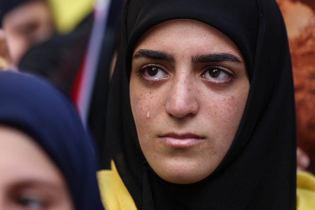 A Hezbollah supporter cries during a protest in Beirut Oct. 18, 2023, after hundreds of Palestinians were killed in a blast the previous day at the CNEWA-supported al-Ahli Arab Hospital in Gaza City. Israeli Defense Forces said it was a failed rocket launch by Palestinian Islamic Jihad. (OSV News photo/Mohamed Azakir, Reuters)