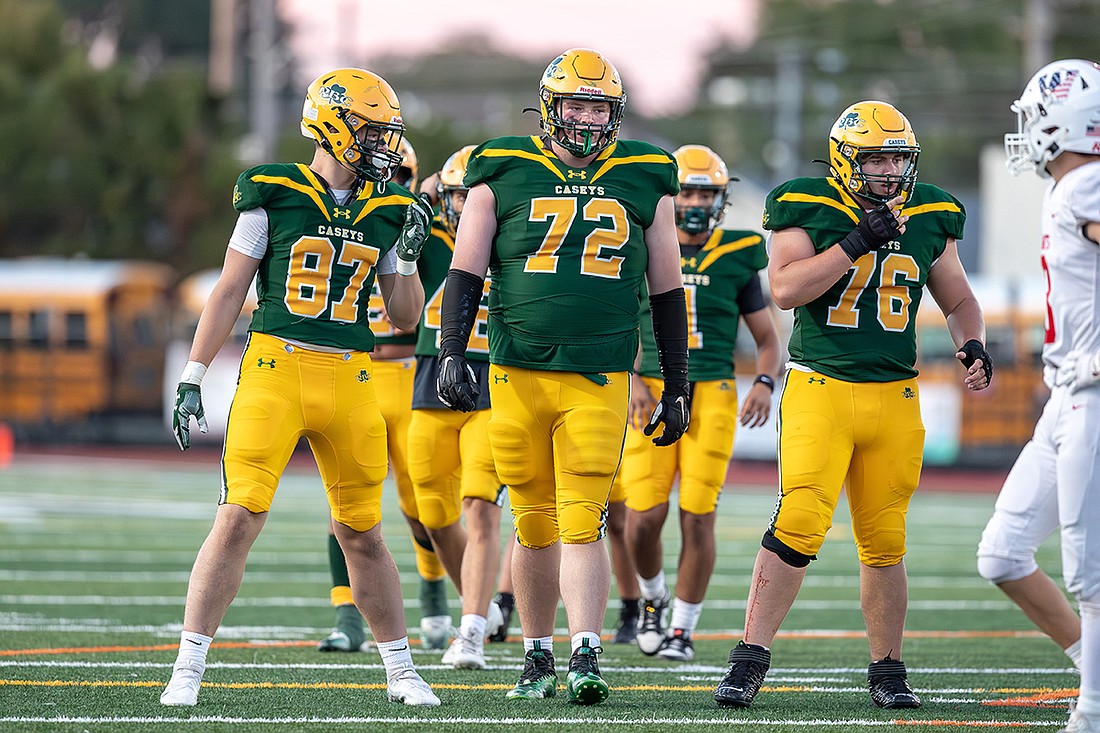 From left, tight end Luke Krzykowski, right guard Tyler Burnham and right tackle Lorenzo Portella are part of a tenacious offensive line that has helped ignite Red Bank Catholic's powerful defense this year. Photo by Jennifer Harms/J Harms Photography