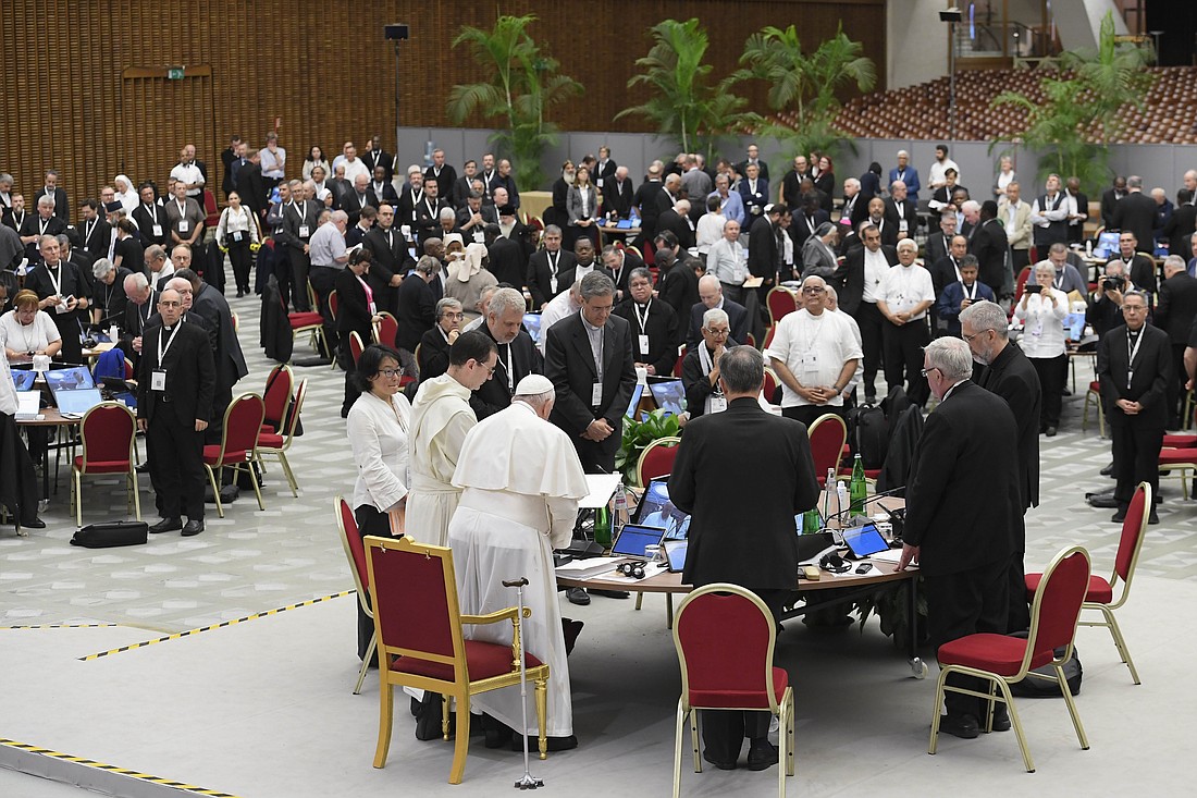 Pope Francis prays with participants in the assembly of the Synod of Bishops before making a rare speech to the gathering Oct. 25, 2023, in the Paul VI Audience Hall at the Vatican. (CNS photo/Vatican Media)