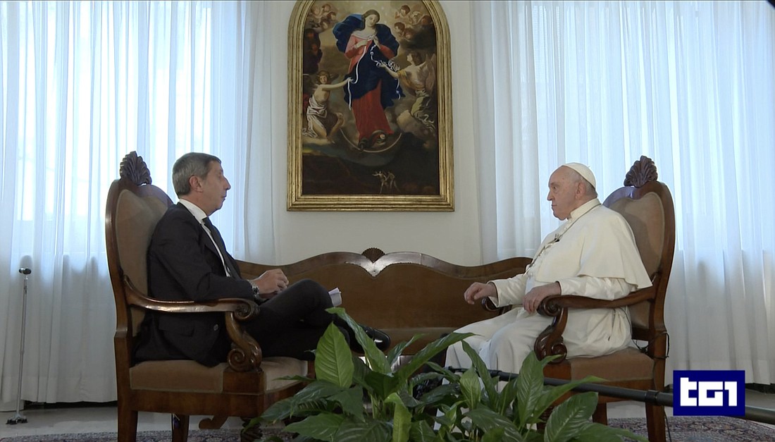 Gian Marco Chiocci, director of the TG1 news program of RAI, the Italian television network, interviews Pope Francis in his residence, the Domus Sanctae Marthae, in this screen grab from a broadcast Nov. 1, 2023. (CNS photo/TG1 via RaiPlay)