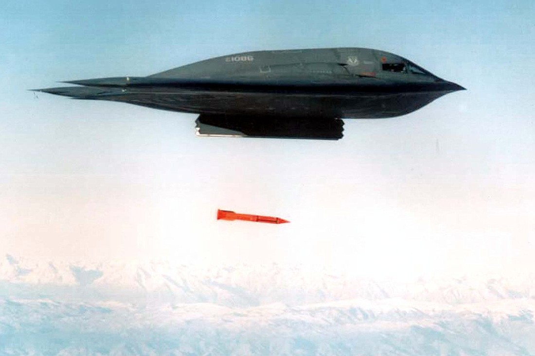 A B-2 Spirit Bomber from Whiteman Air Force Base, Missouri, drops a B61-11 "Bunker Buster" bomb casing during an exercise in this undated photo. The Department of Defense announced Oct. 27, 2023, that it is seeking congressional approval to update the B61 nuclear gravity bomb, which would be designated B61-13 and would be deliverable by modern aircraft. (OSV News photo/Reuters)