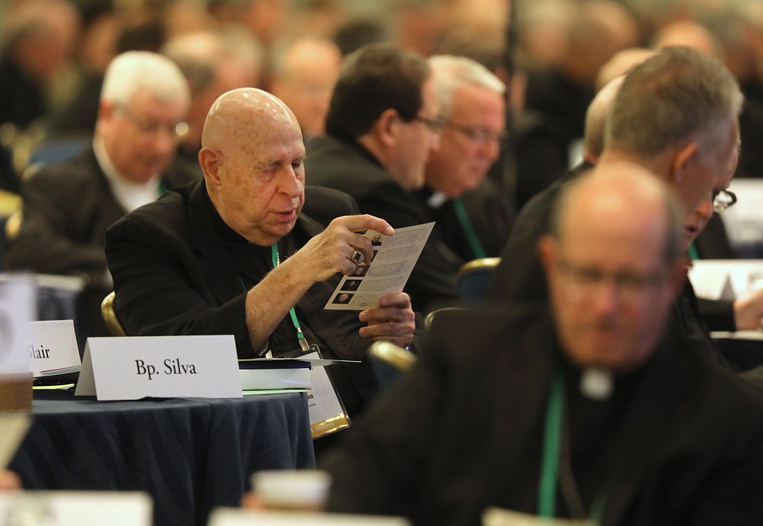 Bishops pray during a Nov. 14, 2023, session of the fall general assembly of the U.S. Conference of Catholic Bishops in Baltimore. (OSV News photo/Bob Roller)