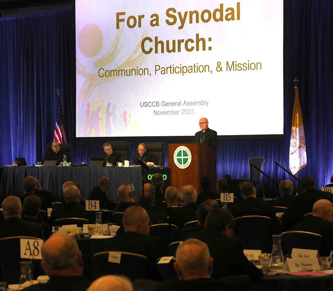 Bishop Kevin C. Rhoades of Fort Wayne-South Bend, Ind., speaks during a conversation about the Synod on Synodality in Rome at a Nov. 14, 2023, session of the fall general assembly of the U.S. Conference of Catholic Bishops in Baltimore. Also pictured are Father Michael J.K. Fuller, USCCB general secretary; Archbishop Timothy P. Broglio of the U.S. Archdiocese for the Military Services, USCCB president; and Archbishop William E. Lori of Baltimore, USCCB vice president. (OSV News photo/Bob Roller)