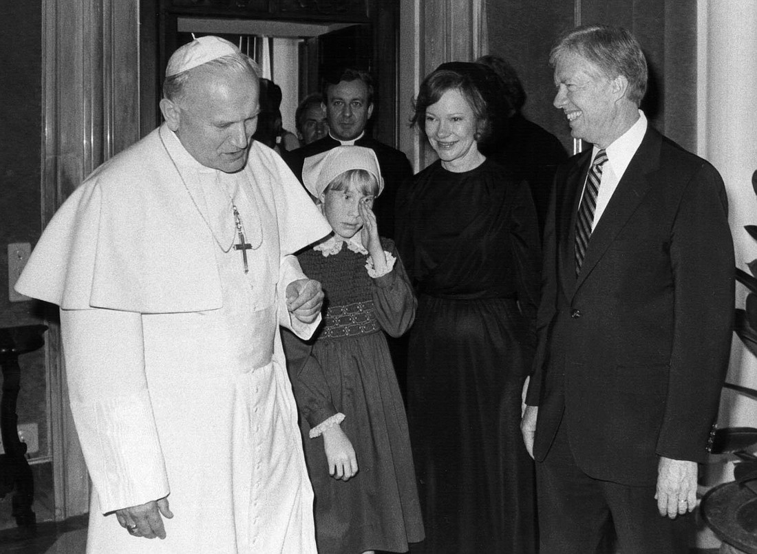 St. John Paul II meets with then-President Jimmy Carter, his wife, Rosalynn, and daughter, Amy, at the Vatican in June of 1980. First lady Rosalynn Carter died Nov. 19, 2023, at age 96. She was her husband's closest adviser to Jimmy Carter during his one term as U.S. president and their four decades thereafter as global humanitarians. (OSV News photo/Arturo Mari)