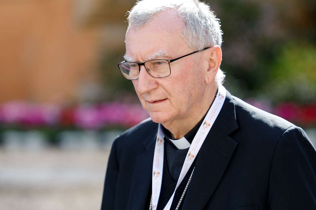 Cardinal Pietro Parolin, Vatican secretary of state, leaves the Vatican's Paul VI Audience Hall after a working session of the assembly of the Synod of Bishops with Pope Francis at the Vatican Oct. 6, 2023. Tensions between the Vatican and the majority of bishops in Germany are mounting over the issue of the ordination of men to the priesthood and the Church’s teaching on homosexuality which Cardinal Parolin emphasized in a letter to the German bishops. CNS photo/Lola Gomez