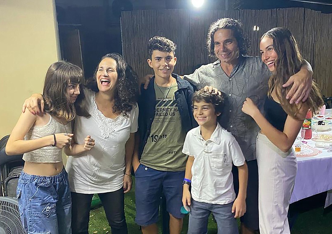 Hadas, second from left, and Ofer Kalderon, second from right, pose in an undated family photo in Kibbutz Nir Oz, Israel, with their four children, from left, Sahar, now 16; Rotem, 19; Erez, 12; and Gaia, 21. Sahar and Erez along with their father were taken hostage by Hamas Oct. 7, 2023, and Hadar has received no word of their fate. They were not in any of the three groups released by Hamas Nov. 24-26. Her mother and niece have been reported murdered in Gaza. (OSV News photo/courtesy Hadas Kalderon) Editors: best quality available.