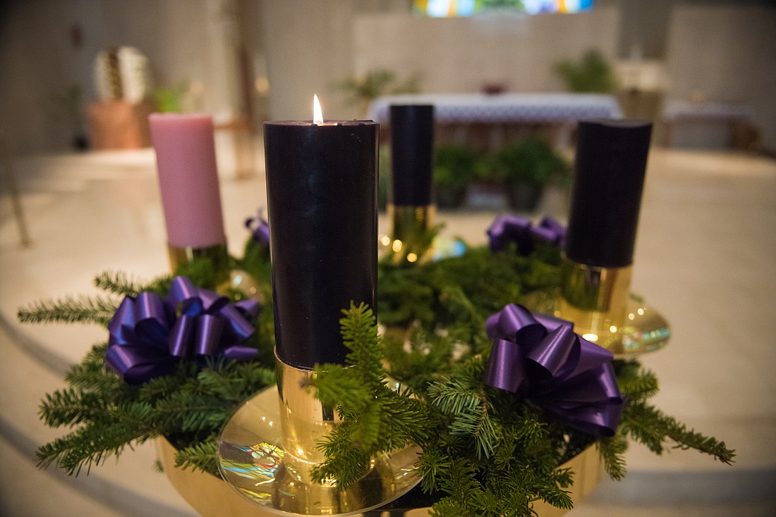 The first Advent candle is lit in St. Pius X Church, Forked River. Monitor file photo/Jeffrey Bruno