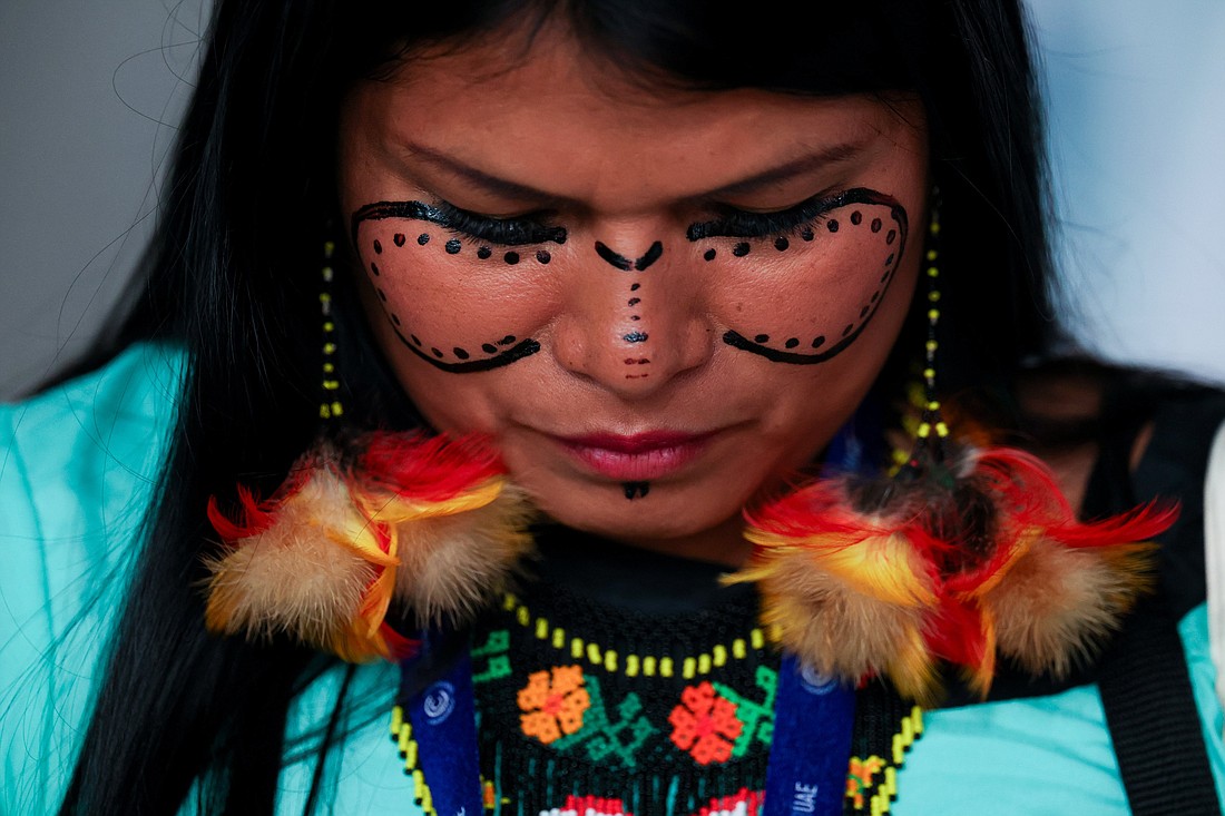 An indigenous community member attends the UNFCCC formal opening of the U.N. Climate Change Conference COP28 at Expo City Nov. 30, 2023, in Dubai, United Arab Emirates. (CNS photo/ courtesy of UN Climate Change COP28, Christopher Pike)