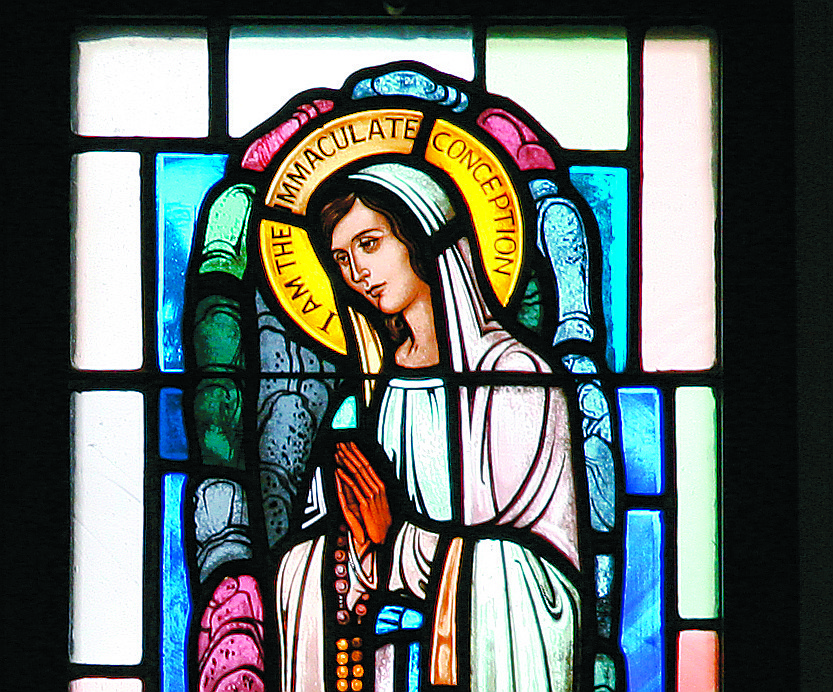 This stained glass image of the Immaculate Conception is found in Our Lady Star of the Sea Church, Long Branch, part of Christ the King Parish. The Solemnity of the Immaculate Conception is celebrated on Dec. 8. File photo