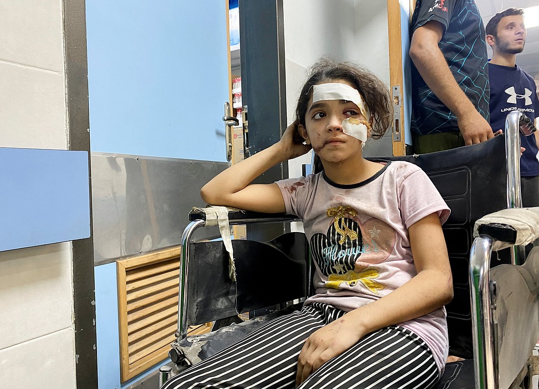 A Palestinian girl wounded in Israeli strikes waits at Al Shifa hospital in Gaza City, Nov. 9, 2023. (OSV News photo/Doaa Rouqa, Reuters)