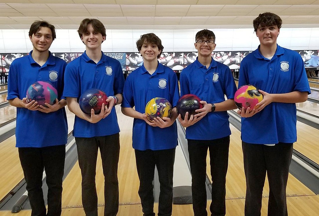 The Donovan Catholic bowling team of, from left, Luke Strippoli, Matt Jinks, Christopher Strippoli, Collin Hopkins and Nicholas Logan, are looking to repeat last year's successes and hopefully add a state title to their achievements this season. Courtesy photo