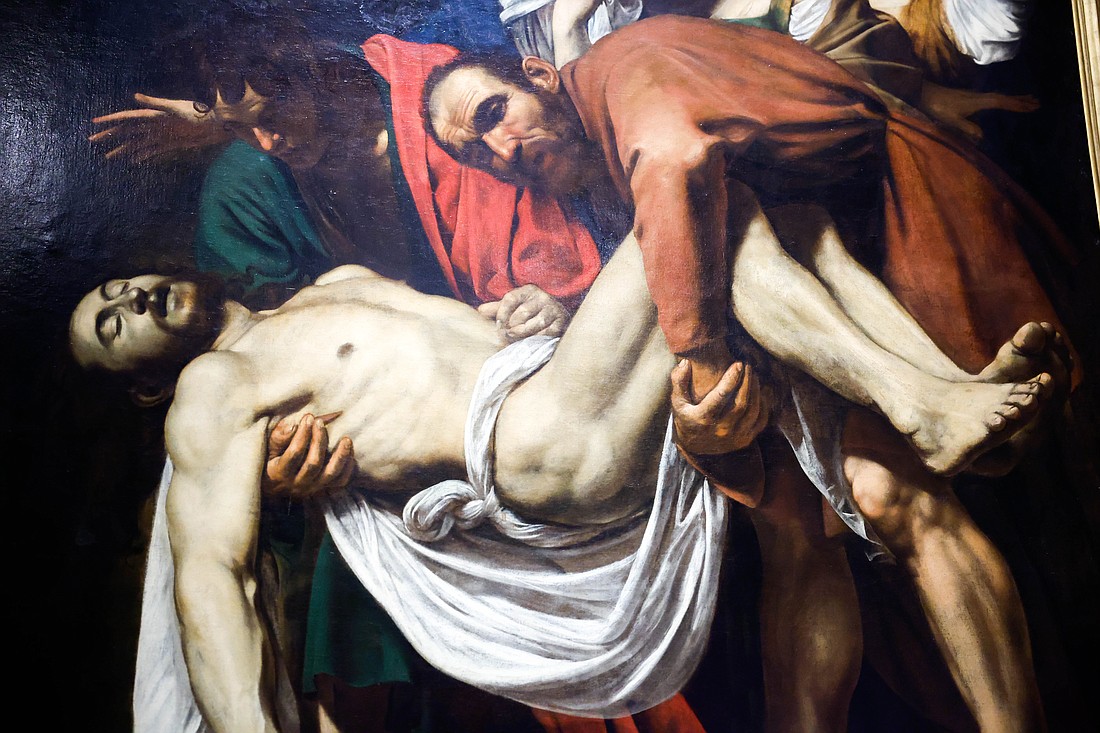 A closeup can be see in this photo of The Deposition by Michelangelo Merisi da Caravaggio in the Vatican Museums at the Vatican Dec. 11, 2023. (CNS photo/Lola Gomez)