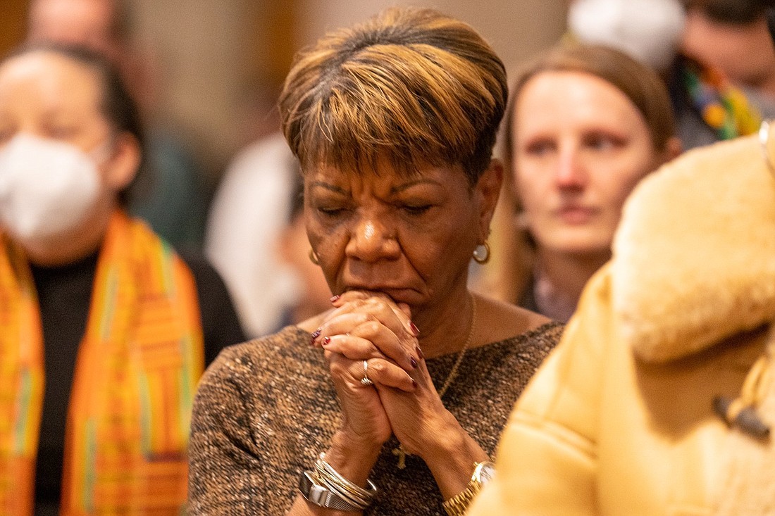 A woman prays in this file photo from Feb 5, 2023 in Washington, D.C. (OSV News photo/Mihoko Owada, Catholic Standard)