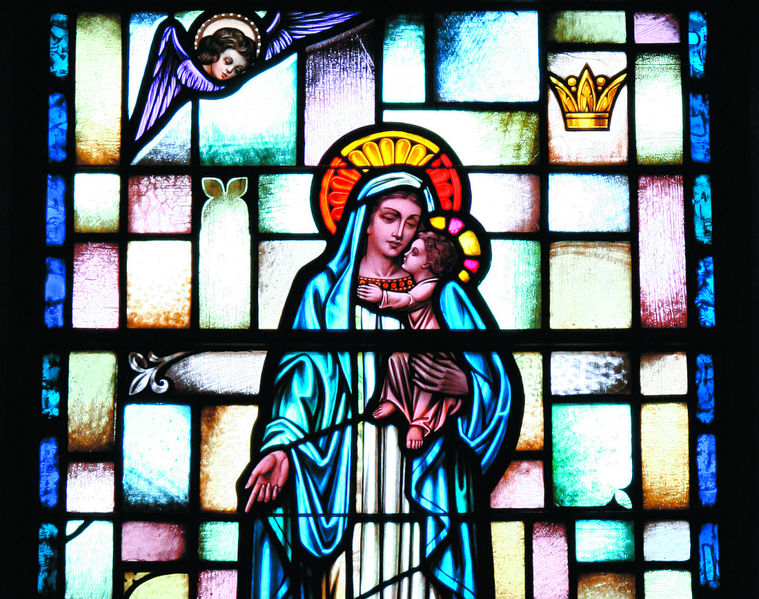 For the Fourth Sunday of Advent, Father Garry Koch reflects on the role the Blessed Virgin Mary had in Salvation History as the Mother of God. This stained glass photo of the Madonna holding the Christ Child is found in Our Lady of Good Counsel Church, West Trenton. File photo