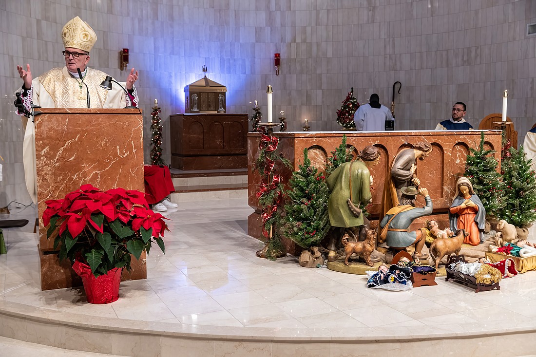 Bishop O'Connell preaches his homily during the Mass he celebrated on Christmas Eve in St. Anthony of Padua Church, Hightstown. Hal Brown photo