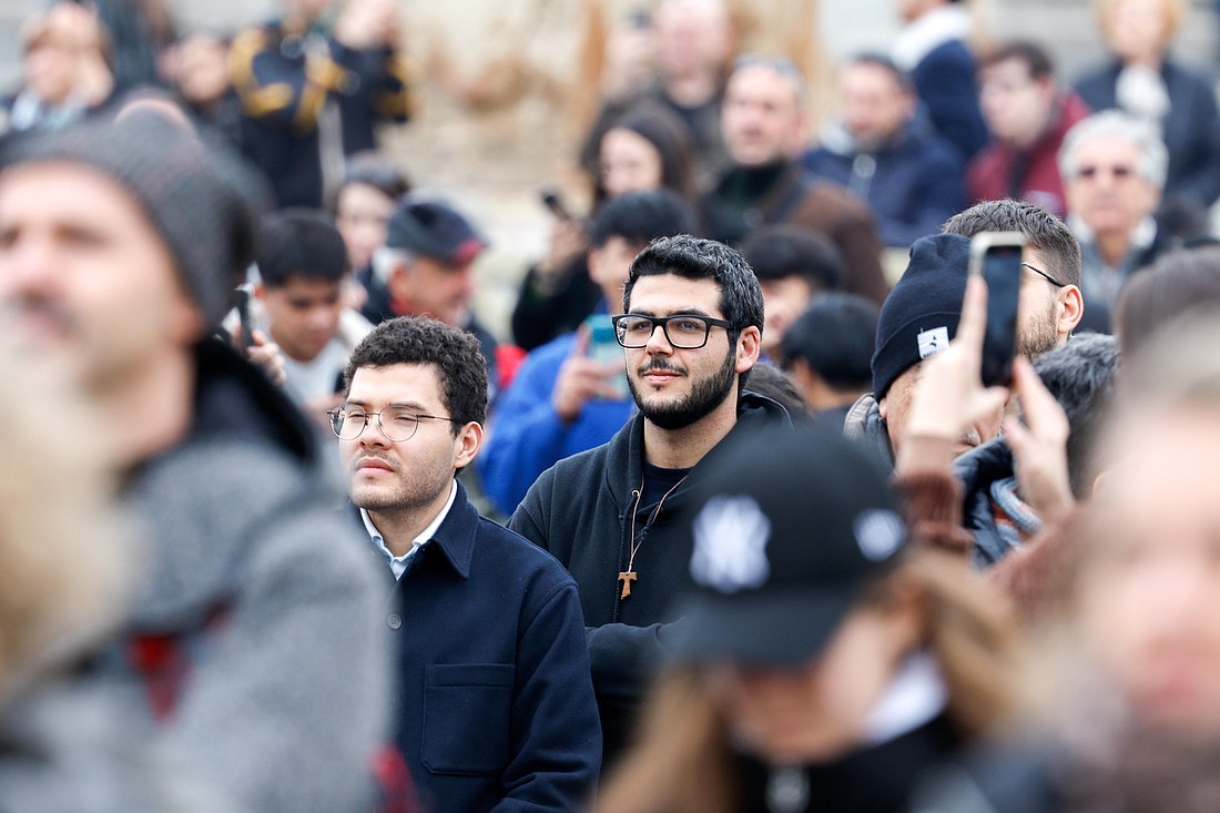 Visitors gather in St. Peter's Square to join Pope Francis for the recitation of the Angelus prayer on the feast of St. Stephen, the first Christian martyr, at the Vatican Dec. 26, 2023. (CNS photo/Lola Gomez