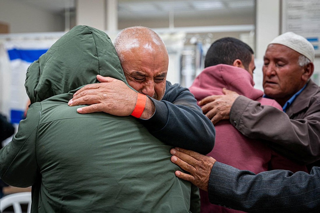 Bilal Al Zaiadna, 21, reunites with his family at Soroka Medical Center in Beersheba, Israel, Dec. 1, 2023, following his release after being held hostage by the Palestinian militant group Hamas in the Gaza Strip. (OSV News photo/courtesy Prime Minister's Office Handout via Reuters)