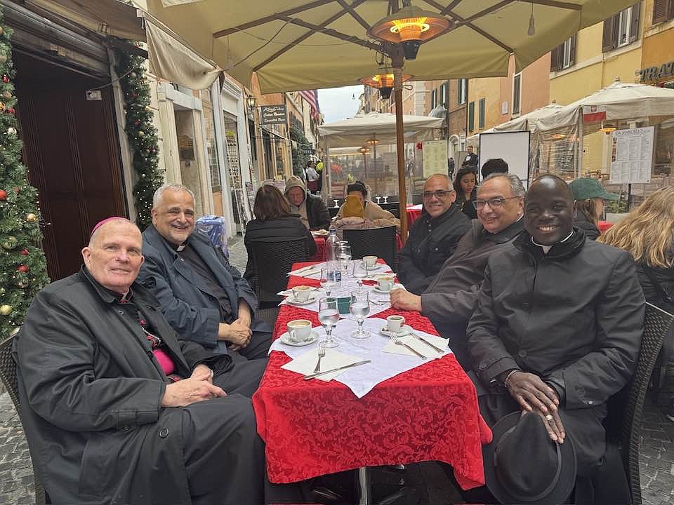 On Jan. 3, Bishop O'Connell, left, and Father Jean Felicien, the Bishop's priest secretary and master of ceremonies meet for lunch with Msgr. Sam Sirianni, Father Daniel Peirano and Msgr. Thomas N. Gervasio who had just arrived to Rome. Staff photo