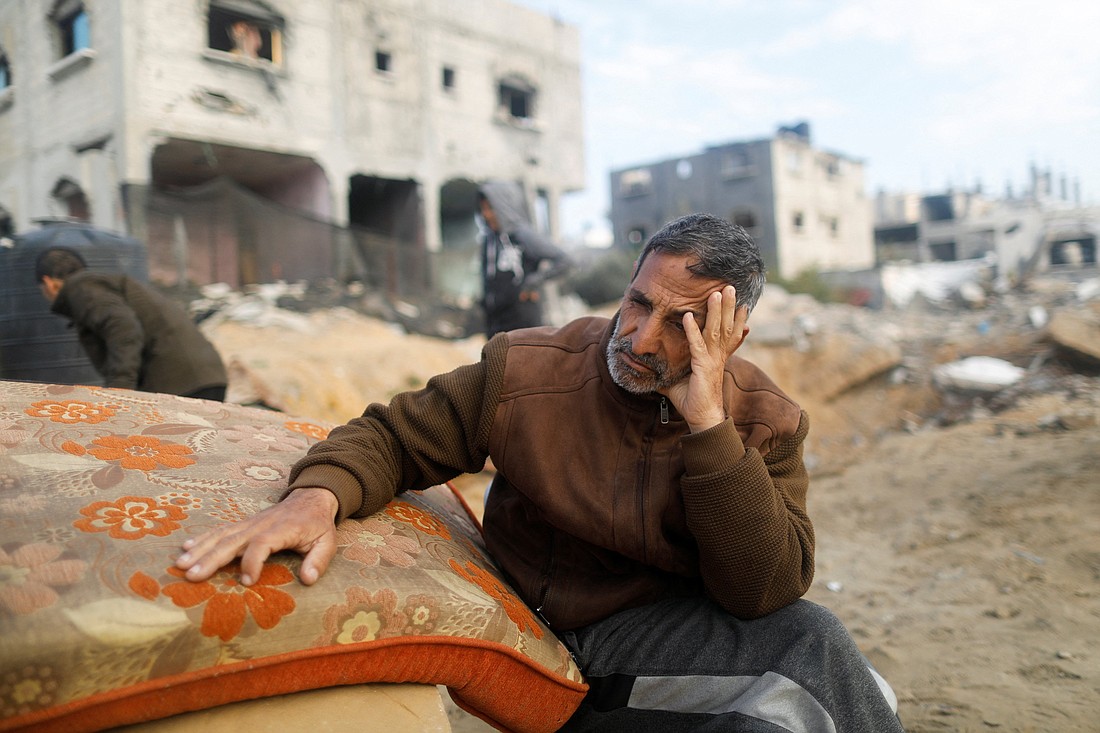 A displaced Palestinian man who fled his home due to Israeli airstrikes reacts Jan. 5, 2024, as he takes shelter in a tent camp in Rafah, southern Gaza Strip, amid the ongoing conflict between Israel and the Palestinian Islamist group Hamas. (OSV News photo/Saleh Salem, Reuters)