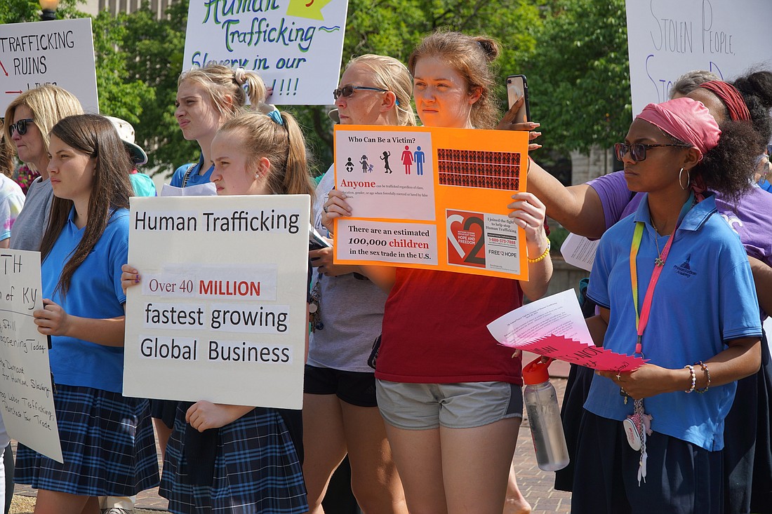 A group including students from Sacred Heart Academy and Presentation Academy in Louisville, Ky., listens to a speaker during the seventh annual prayer service for the victims of human trafficking on April 30, 2019, at Jefferson Square Park in downtown Louisville. (OSV News photo/CNS file, Ruby Thomas)