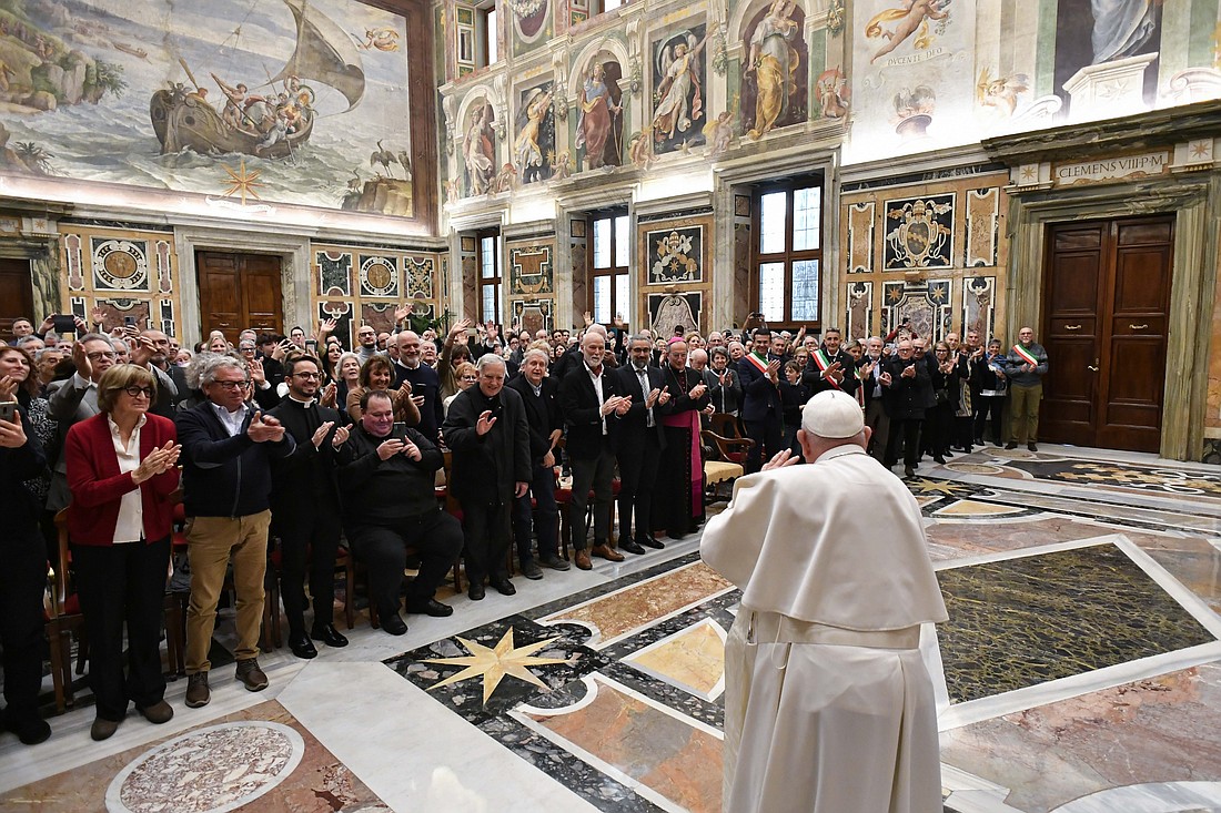 Pope Francis waves goodbye to pilgrims from the Diocese of Belluno-Feltre and from the association "Vajont: The Future of Memory," and local government officials after an audience in the Apostolic Palace at the Vatican Jan. 19, 2024. The group was commemorating the anniversary of a massive landslide in October 1963 that killed 1,910 people in northern Italy. (CNS photo/Vatican Media)