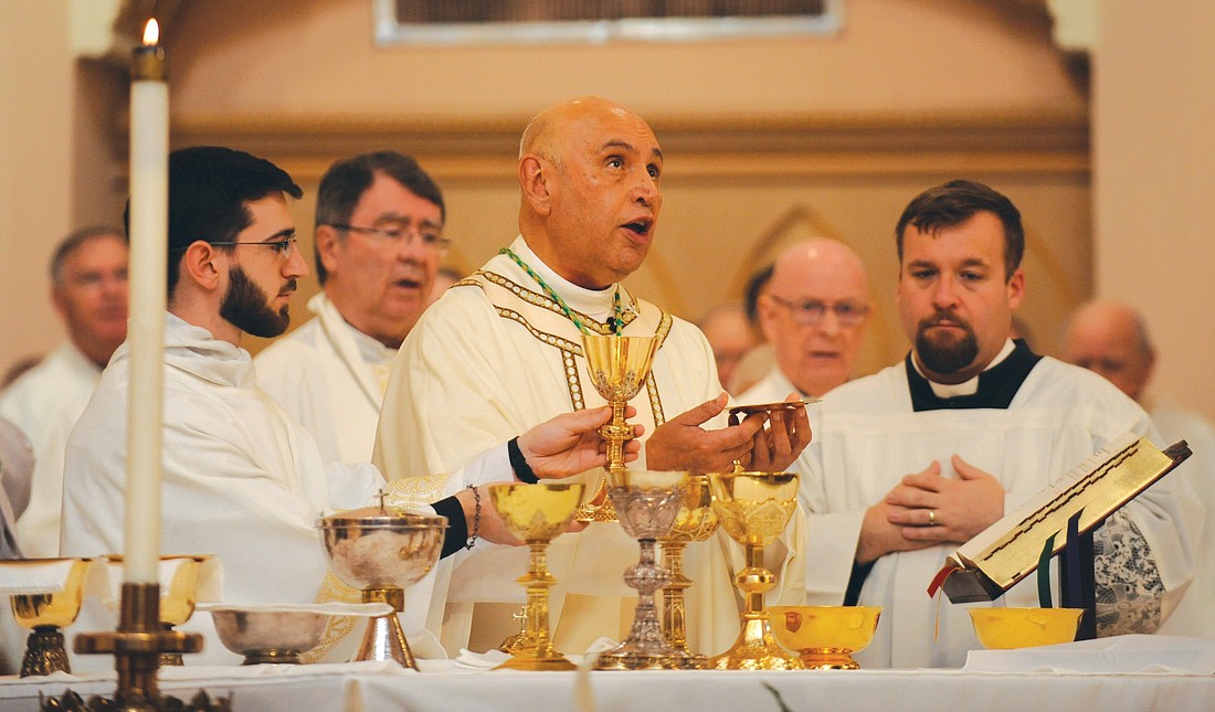 Bishop Mario E. Dorsonville, the fifth bishop of Houma-Thibodaux, La., has passed away at age 63. He died Jan. 19, 2023, from complications related to recent health problems, the diocese announced. He is seen celebrating his installation Mass March 29, 2023, at the Cathedral of St. Francis de Sales in Houma. (OSV News photo/Lawrence Chatagnier, Bayou Catholic)