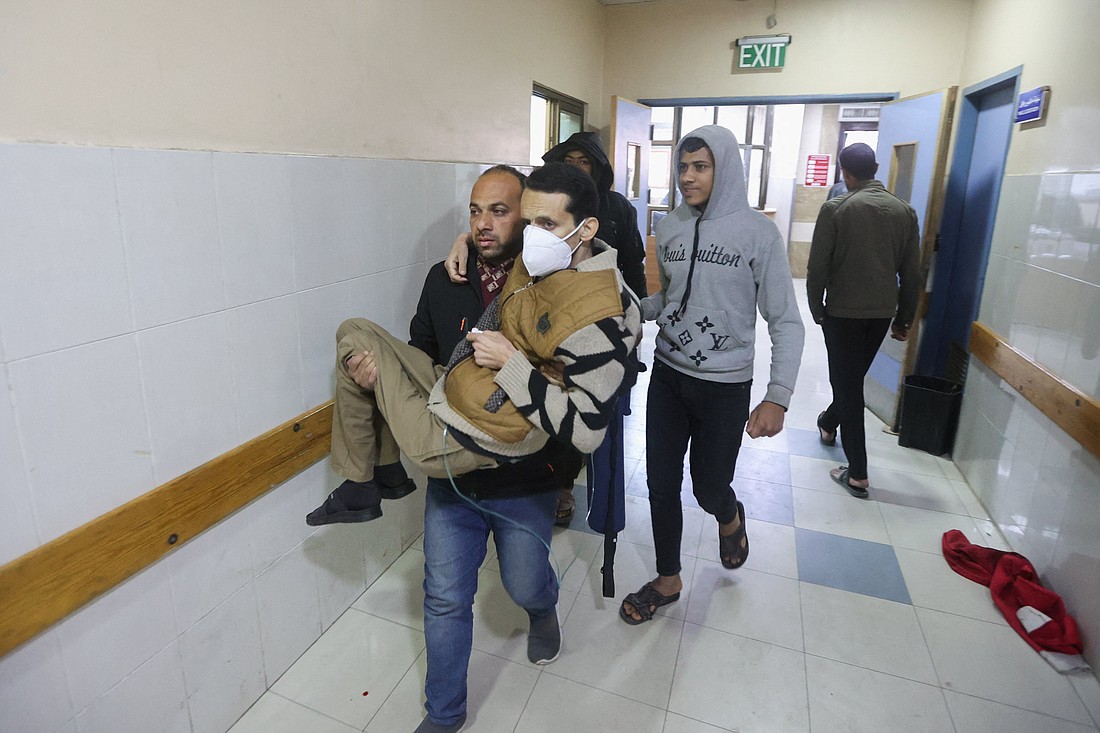 A Palestinian is carried into Nasser Hospital Jan. 22, 2024, in Khan Younis in the southern Gaza Strip who was wounded in an Israeli airstrike, amid the ongoing conflict between Israel and the Palestinian Islamist group Hamas. (OSV News photo/Ahmed Zakot, Reuters)